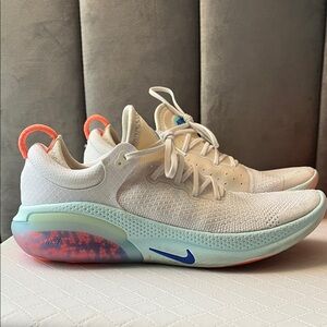 Nike Women's joyride run White and Coral Athletic Shoes